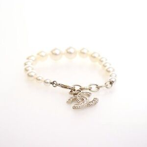 CHANEL Pearl Bracelet with Silver Logo Charm
